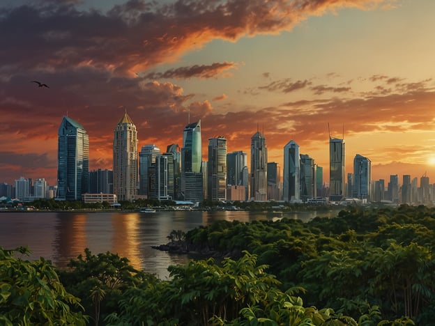 Auf dem Bild entfaltet sich ein atemberaubendes Panorama von Panama-Stadt, das den Betrachter in seinen Bann zieht. Die imposanten Wolkenkratzer erheben sich majestätisch gegen den strahlenden Himmel und spiegeln das warmes Licht der untergehenden Sonne wider. Das Spiel von orangefarbenen und violetten Farbtönen im Himmel verwandelt die Szenerie in ein lebendiges Kunstwerk. Im Vordergrund grünen üppigen Vegetation, die das Stadtbild harmonisch ergänzt, während das ruhige Wasser des Kanals sanft die umgebenden Strukturen umspielt. Diese Aussicht ist ein wahres Fest für die Sinne und zeugt von der einzigartigen Schönheit und Dynamik dieser faszinierenden Stadt.