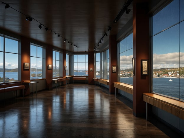 Auf dem Bild ist ein Innenraum mit großen Fenstern zu sehen, der einen Blick auf eine malerische Landschaft bietet. Diese Art von Raum könnte in einem Museum oder einer Galerie sein. Wenn du die Umgebung erkunden möchtest, sind einige Sehenswürdigkeiten, die du nicht verpassen solltest:

1. **Fjordlandschaften** – Die norwegischen Fjorde sind atemberaubend und bieten spektakuläre Ausblicke und Wanderungen.
2. **Museen** – Besuche das Munch Museum oder das Fram Museum in Oslo, um mehr über die Kunst und die maritime Geschichte zu erfahren.
3. **Historische Stätten** – Die Festung Akershus in Oslo ist ein tolles Ziel, um mehr über die Geschichte Norwegens zu erfahren.
4. **Kunstgalerien** – Die Astrup Fearnley Museen für moderne Kunst ist ein weiteres Highlight in Oslo.

Diese Sehenswürdigkeiten werden dir unvergessliche Eindrücke von der norwegischen Kultur und Natur vermitteln!